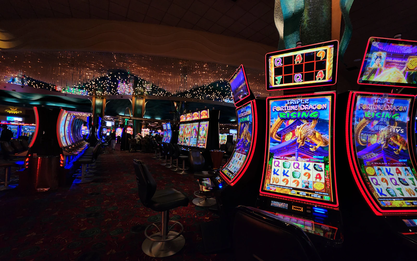 Rows of slot machines inside a casino